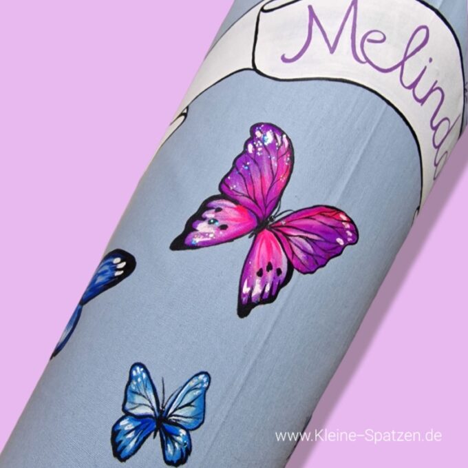 Schultüte Schmetterlinge und Banner mit Namenszug und Glitzer